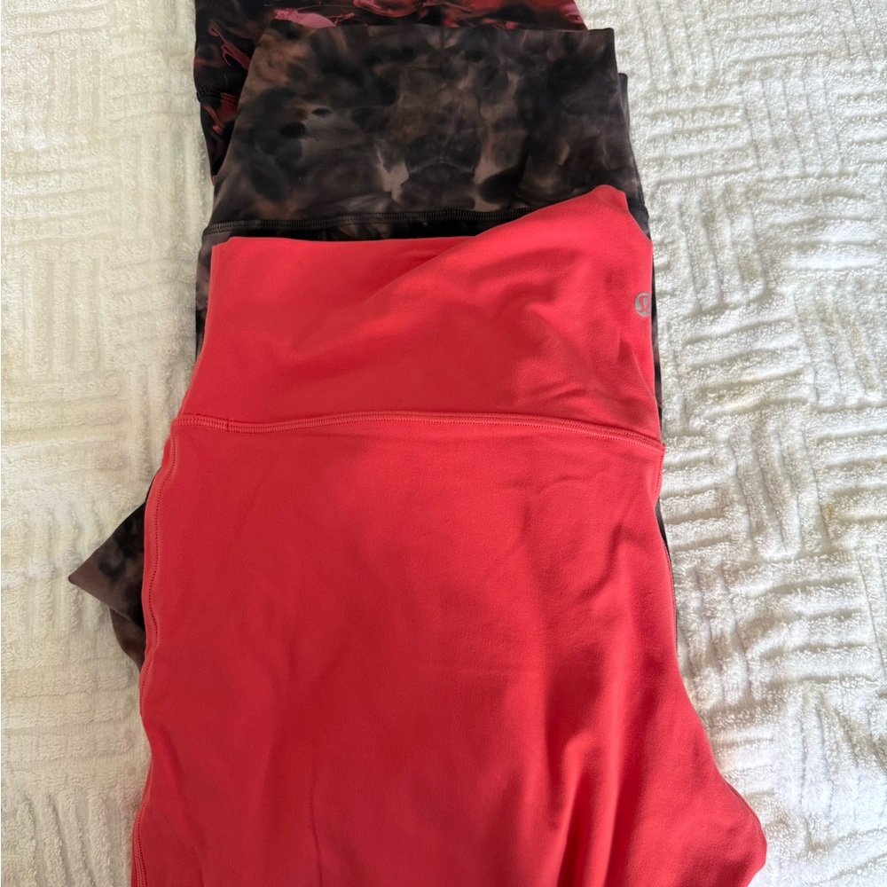 lululemon athletica Coral and Dark Patterned Leggings. 3 pairs of leggings!!!!!